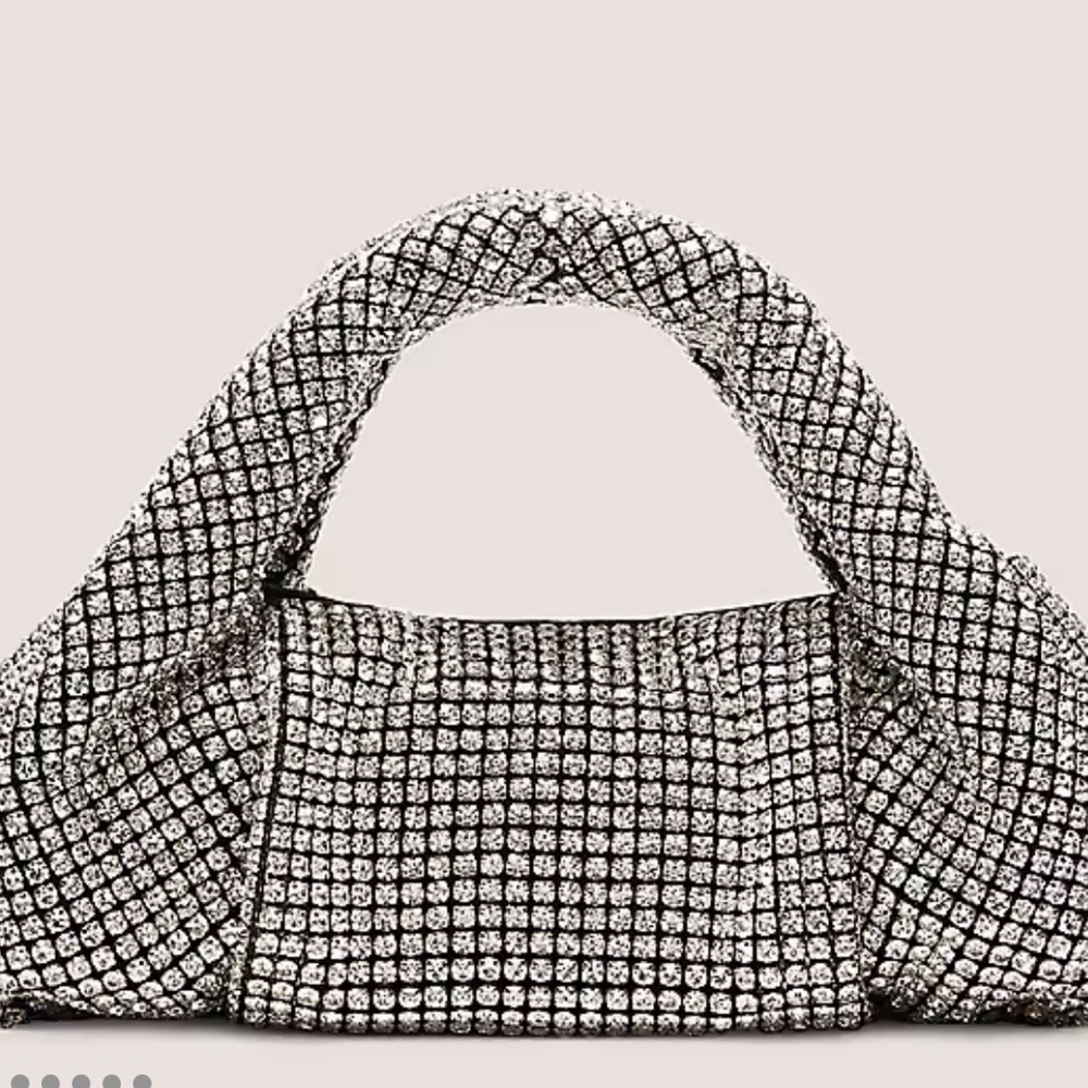 Brand new with tags and dust bag.